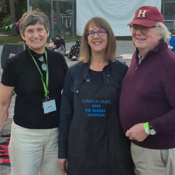 Elizabeth Ainslie, 2025 Pie Baking Champion with judges.