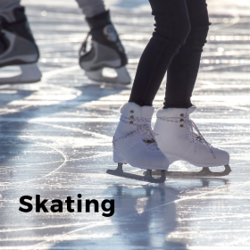 Visual of hockey and figure skates on a rink.